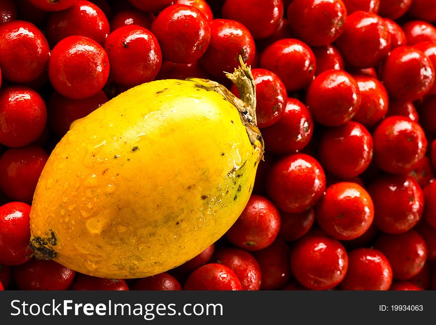 Yellow and red palm fruits in Thailand