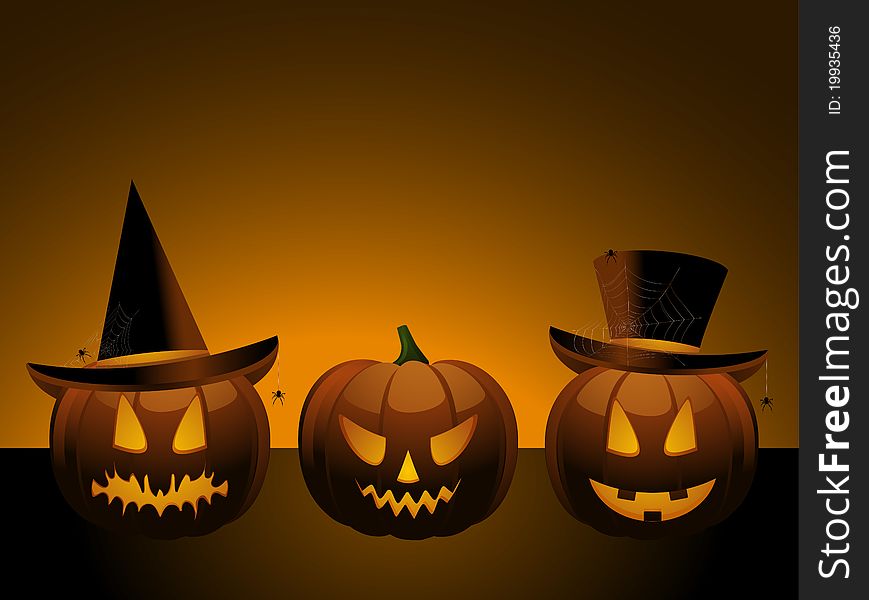 Three halloween pumpkins, one wearing withch's hat and one wearing a top hat