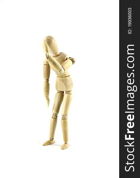 Depressed wooden doll on a white background. Depressed wooden doll on a white background