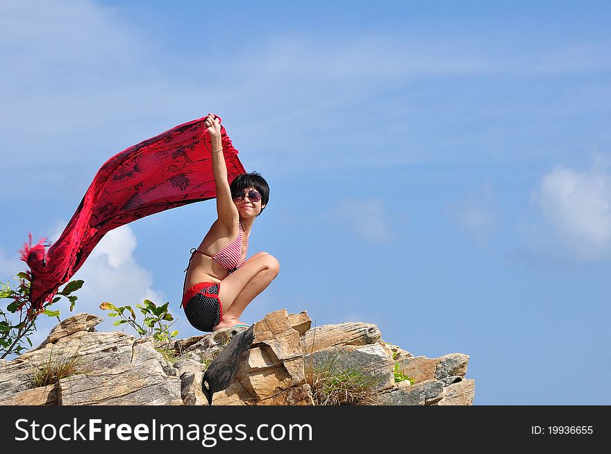 Asian Woman On Stone