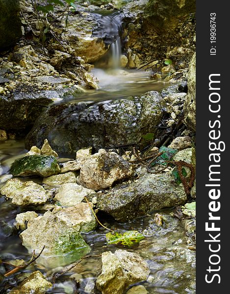 Mountain stream, with small cascades of falls