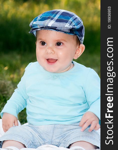 Cute little baby boy portrait outdoors