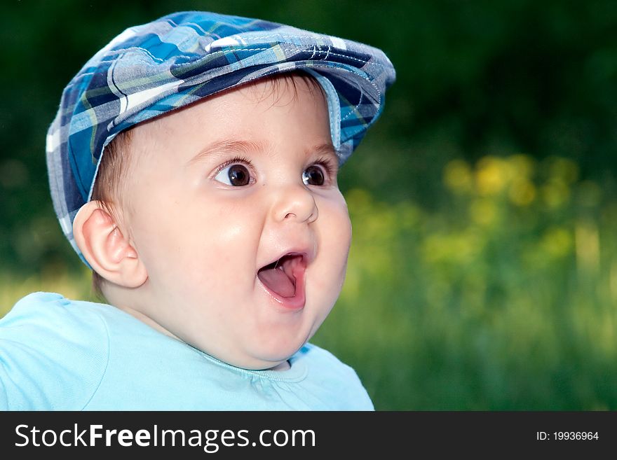 Cute little baby boy portrait outdoors