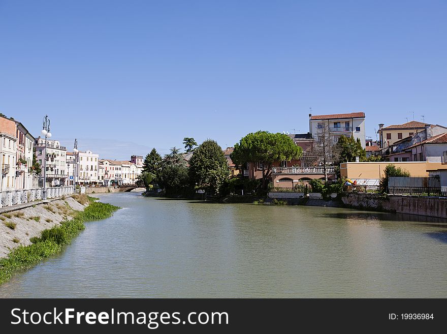 River and old buildings, Italy