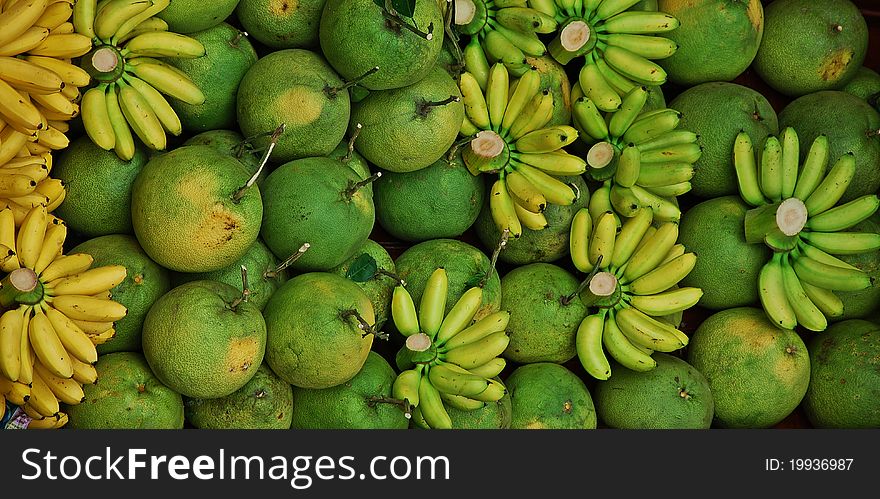 Bundle of fruites: bananas and limes. Bundle of fruites: bananas and limes