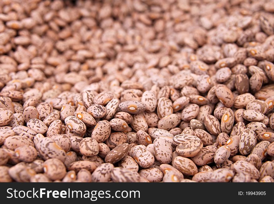 A background of brown beans. A background of brown beans.