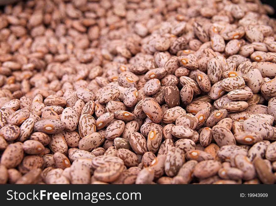 A background of brown beans. A background of brown beans.