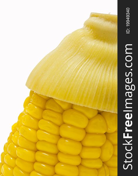 Yellow corn, cooked with white background.