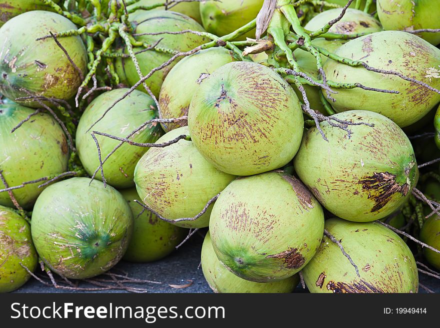 A group of green coconuts