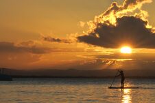 Private Golden Sunset For This Lucky Stand Up Silhouetted Sportswoman At The Paradise Village Of Barra Grande, Bahia, Brazil. Royalty Free Stock Photo Private Golden Sunset For This Lucky Stand Up Silhouetted Sportswoman At The Paradise Village Of Barra Grande, Bahia, Brazil. Royalty Free Stock Photo