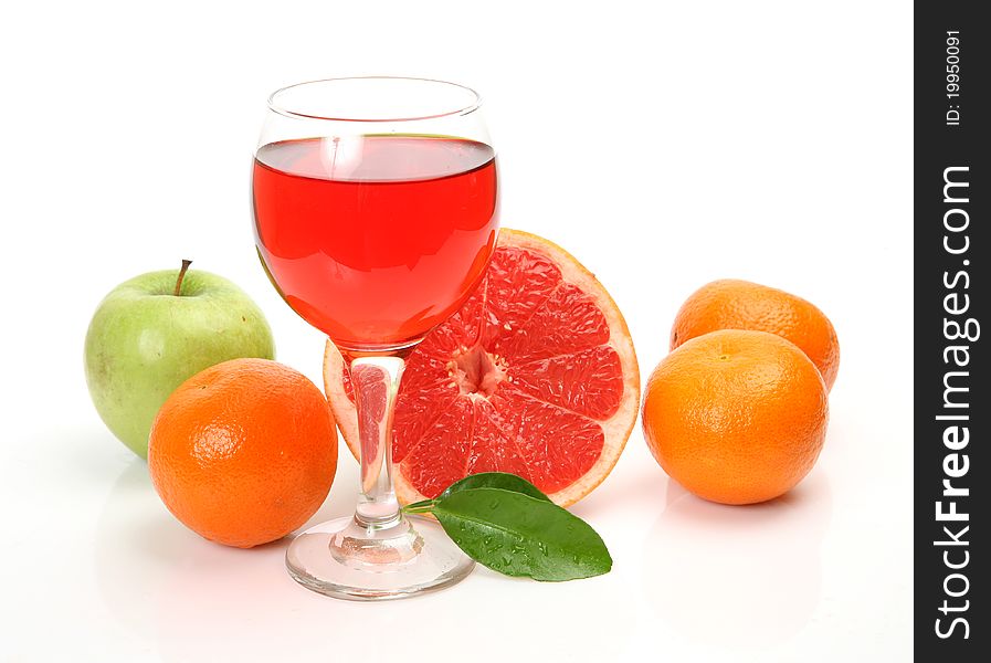 Fresh fruit and juice on a white background