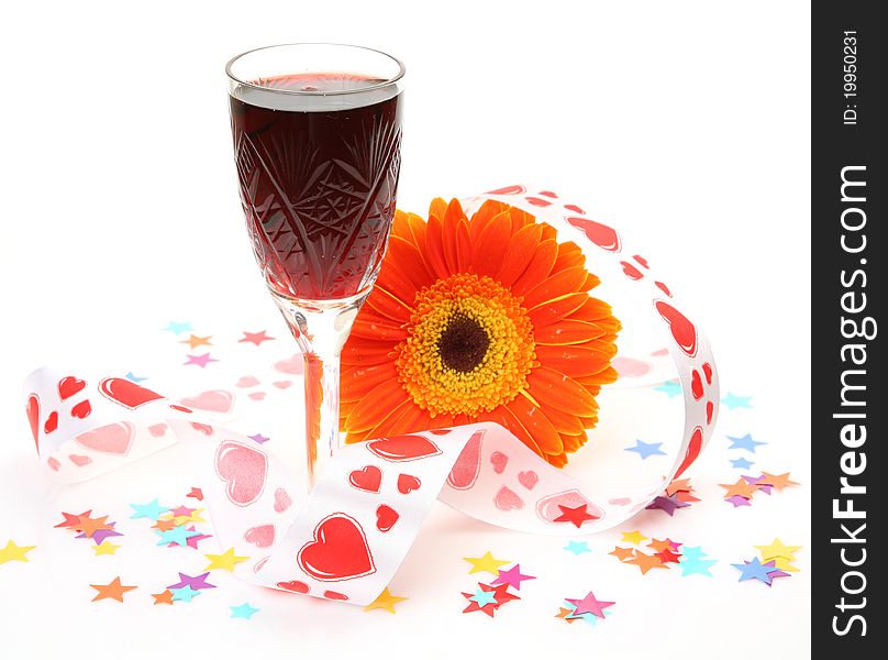 Wine and flower on a white background