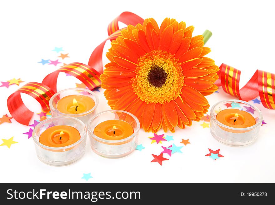 Flower and candles on a white background