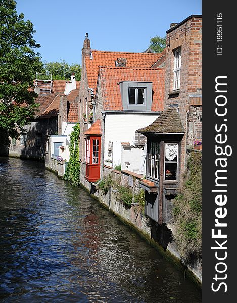 Houses in Bruges standing by a canal. Houses in Bruges standing by a canal