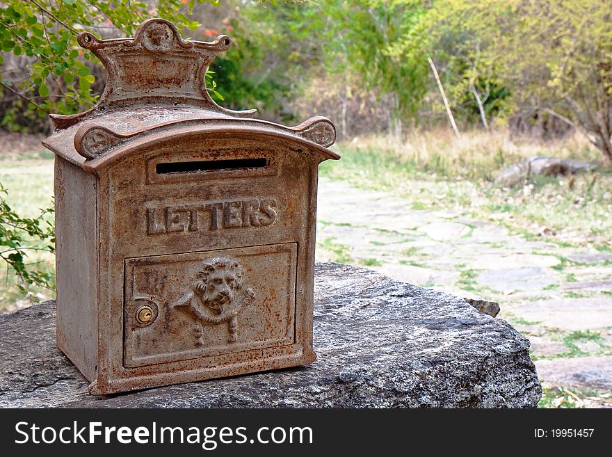 Ornate rusty mailbox in a jungle resort, India. Ornate rusty mailbox in a jungle resort, India.