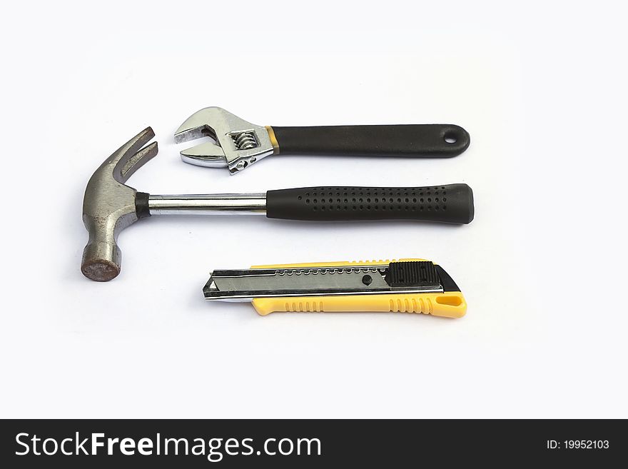 Wrench, hammer, cutter, on a white background. Wrench, hammer, cutter, on a white background.