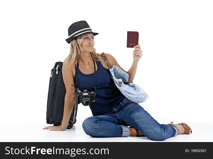 Tourist woman traveling with her passport, luggage, and a camera. Tourist woman traveling with her passport, luggage, and a camera