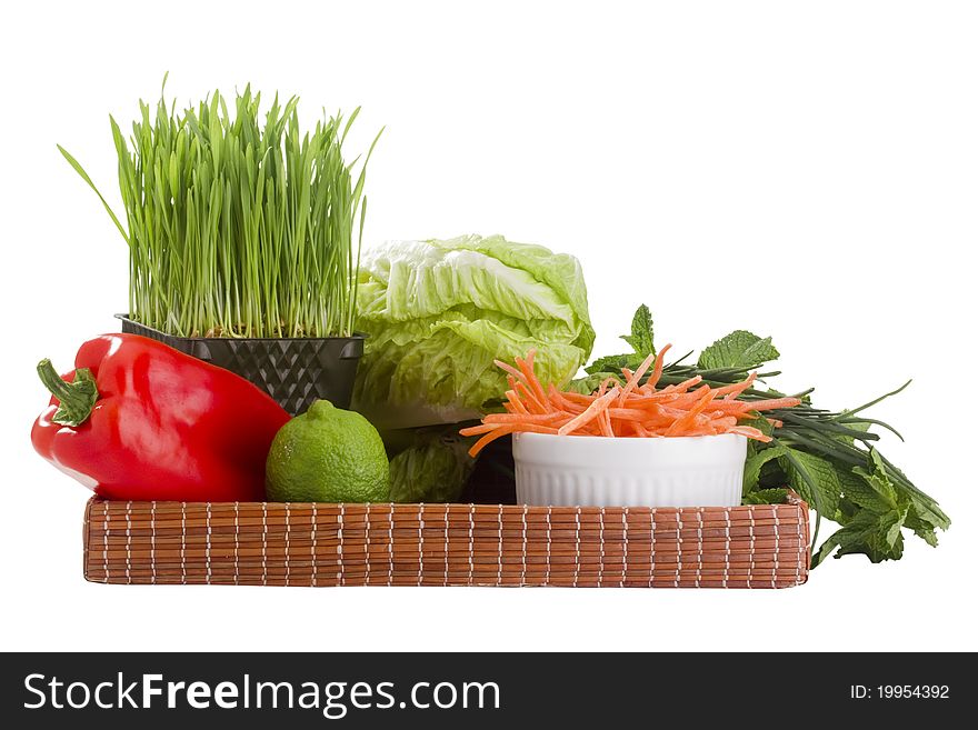 Tray of vegetables isolated on a white background. Tray of vegetables isolated on a white background.