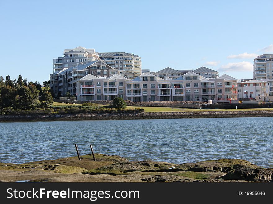 Row of new houses overlooking the water. Row of new houses overlooking the water