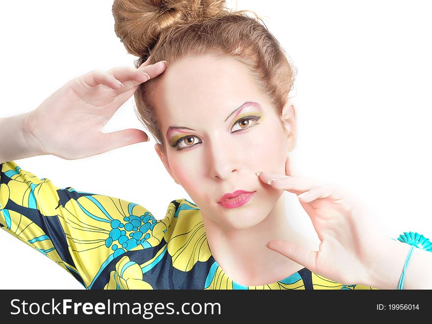 Portrait of beautiful woman with bright makeup over white