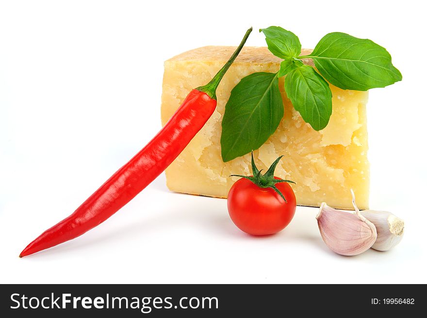 An image of cheese, tomato, pepper, garlic and basil. An image of cheese, tomato, pepper, garlic and basil