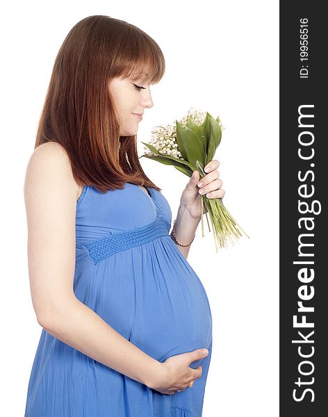 Portrait of a pregnant woman in blue dress. Portrait of a pregnant woman in blue dress