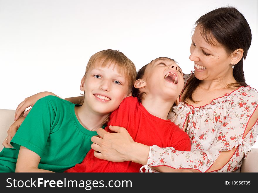 Nice family of a three sitting on sofa. Nice family of a three sitting on sofa