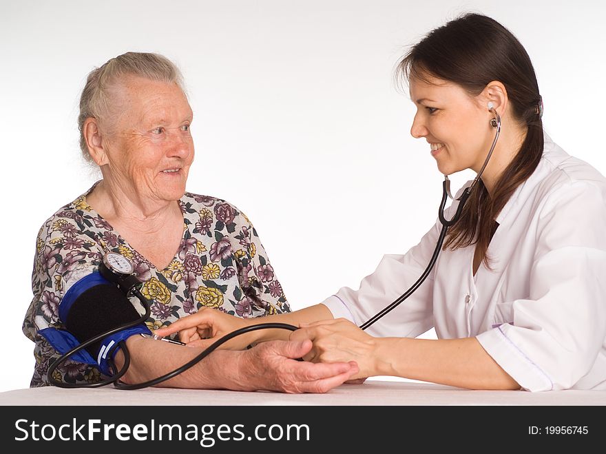 Doctor serving the patient on a white. Doctor serving the patient on a white