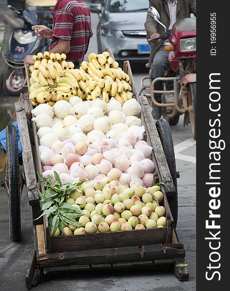 Asian fruit hawkers,street pedlar