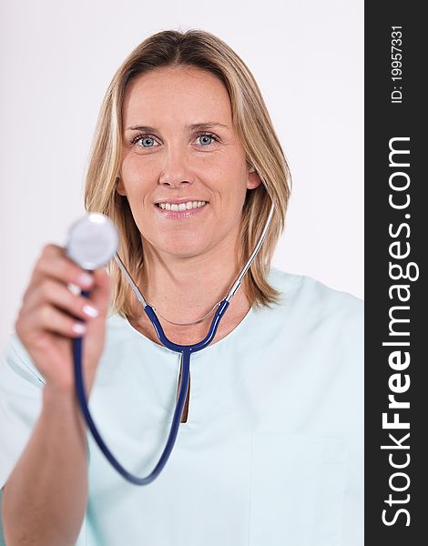 Blond woman doctor with stethoscope in hospital. Blond woman doctor with stethoscope in hospital