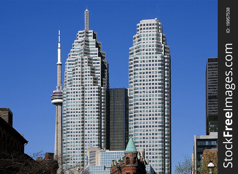 Skyscrapers, CN Tower and Gooderham Building in Toronto, Ontario. Skyscrapers, CN Tower and Gooderham Building in Toronto, Ontario