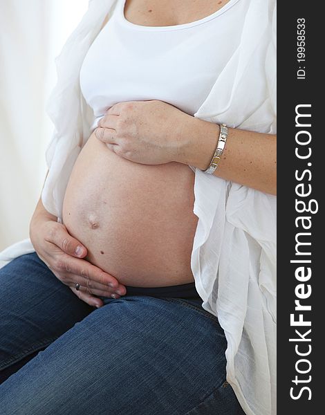 Shot of a pregnant woman and her belly