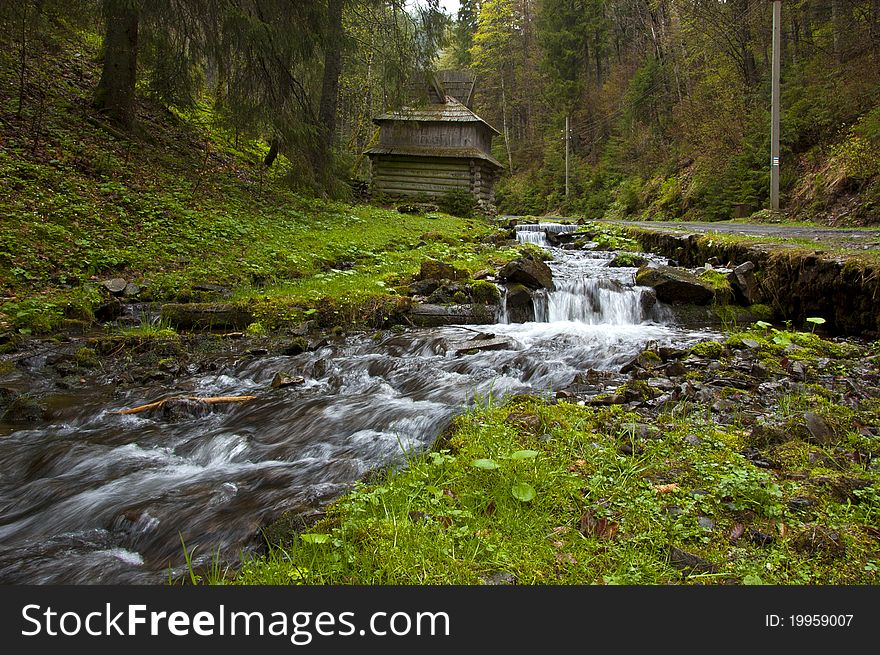 Hut By The Stream.