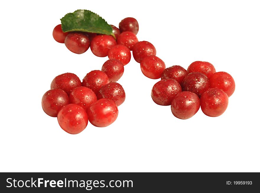 Fresh red cherries with leaf isolated on white. Fresh red cherries with leaf isolated on white