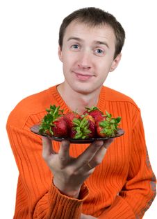 Young Man Holding A Strawberry Royalty Free Stock Photo Young Man Holding A Strawberry Royalty Free Stock Photo