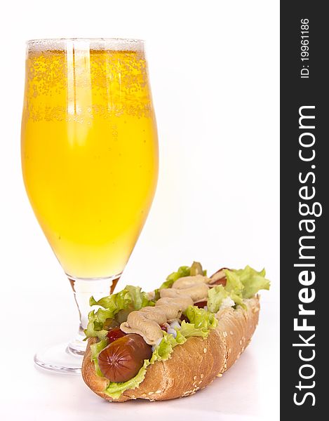 Glass of  beer and hot dog