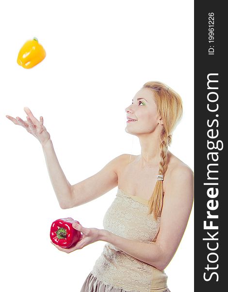 Woman With Yellow And Red Peppers