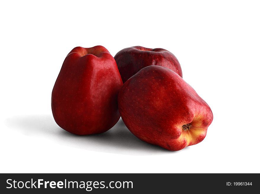 Three red apples isolated on a white background in studio. Three red apples isolated on a white background in studio.