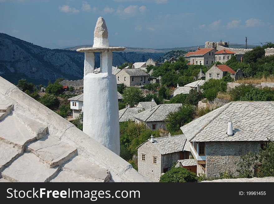 A photograph across the rooftops of Pocitelj, Bosnia and Herzegovina