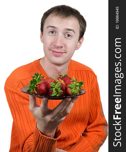 Young Man Holding A Strawberry