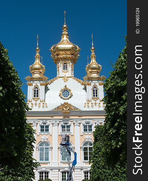 The Big Palace against blue sky. Peterhof,St.Petersburg, Russia.Resatoration works of Greate Peterhof Palace. The Big Palace against blue sky. Peterhof,St.Petersburg, Russia.Resatoration works of Greate Peterhof Palace