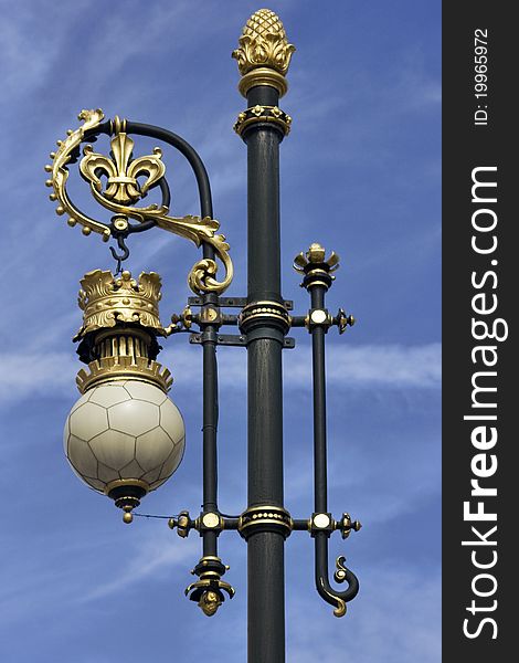 Ornate details on streetlamp in front of Palacio Real. Madrid. Spain. Ornate details on streetlamp in front of Palacio Real. Madrid. Spain