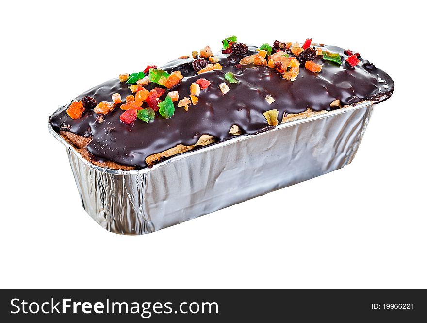 A freshly baked isolated candied Christmas fruitcake. A freshly baked isolated candied Christmas fruitcake.