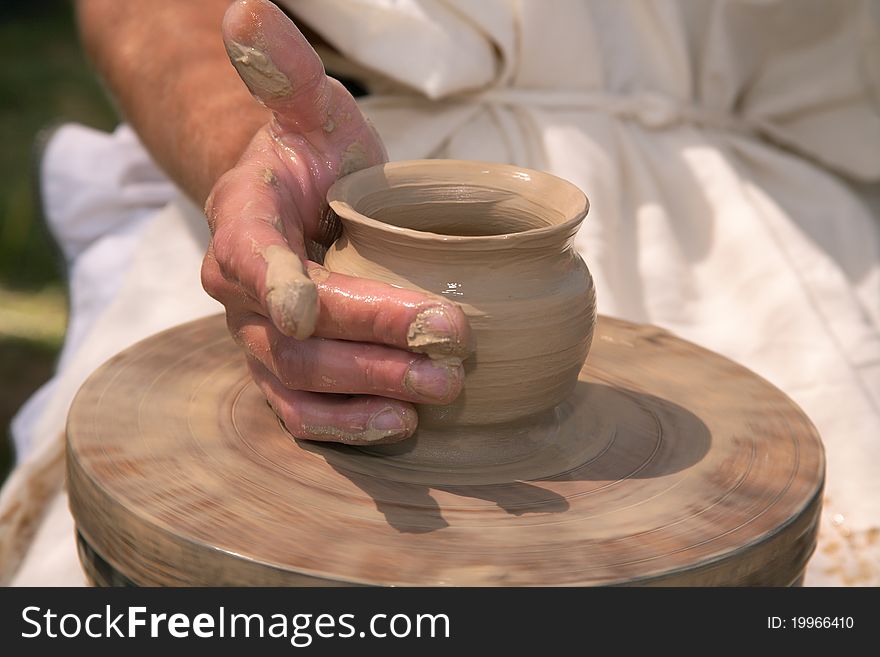 Magic transformation of a piece of clay into the true  utensils. Magic transformation of a piece of clay into the true  utensils.