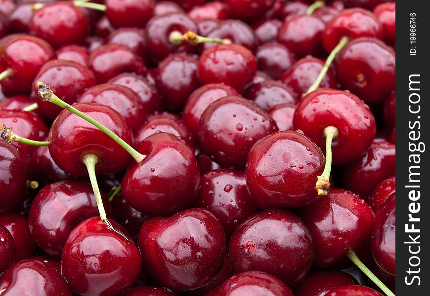 This is a sweet red cherry background. This is a sweet red cherry background