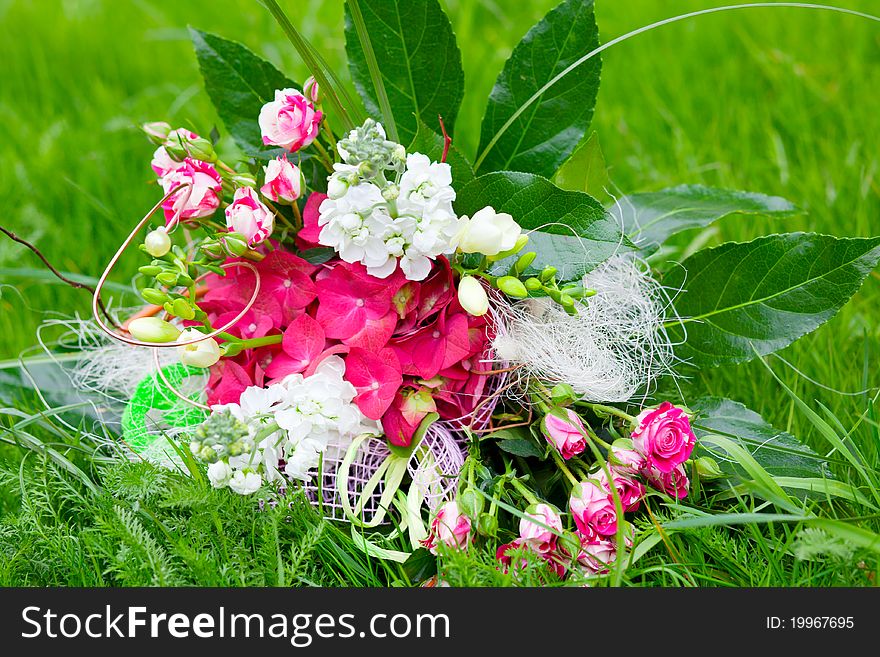 Colorful bunch of flowers on the lawn