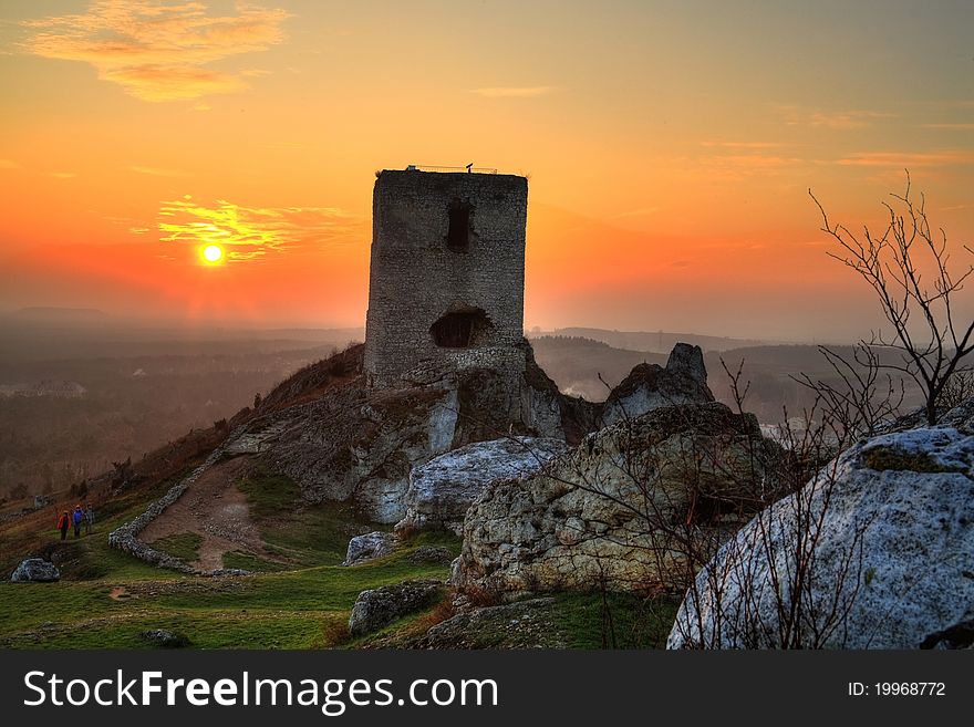 Sunset over ruin of madieval castle