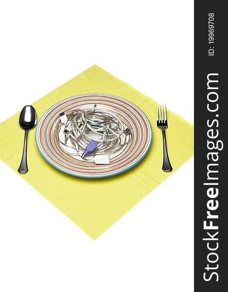 Computer cables on plate with silver ware