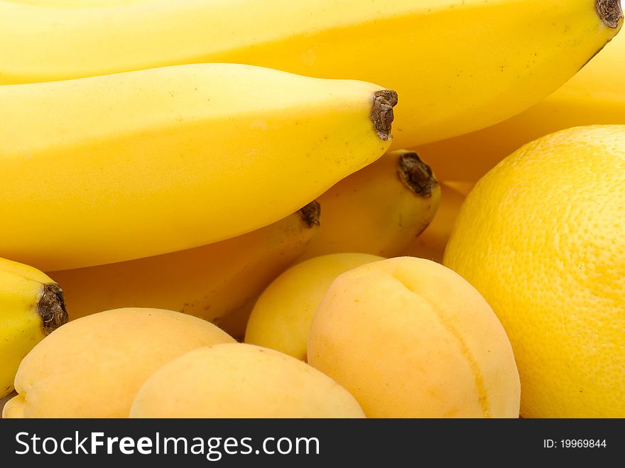 Yellow background of fresh fruits. Yellow background of fresh fruits