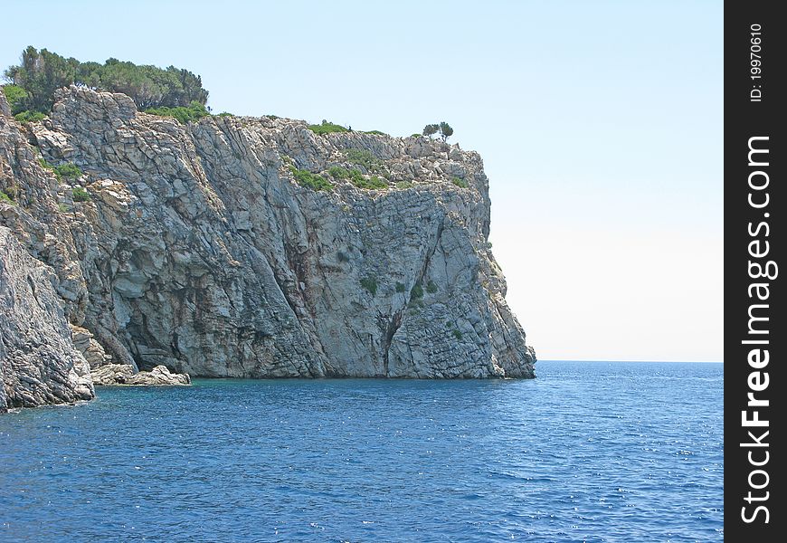 Aegean sea landscape view of high rock. Aegean sea landscape view of high rock